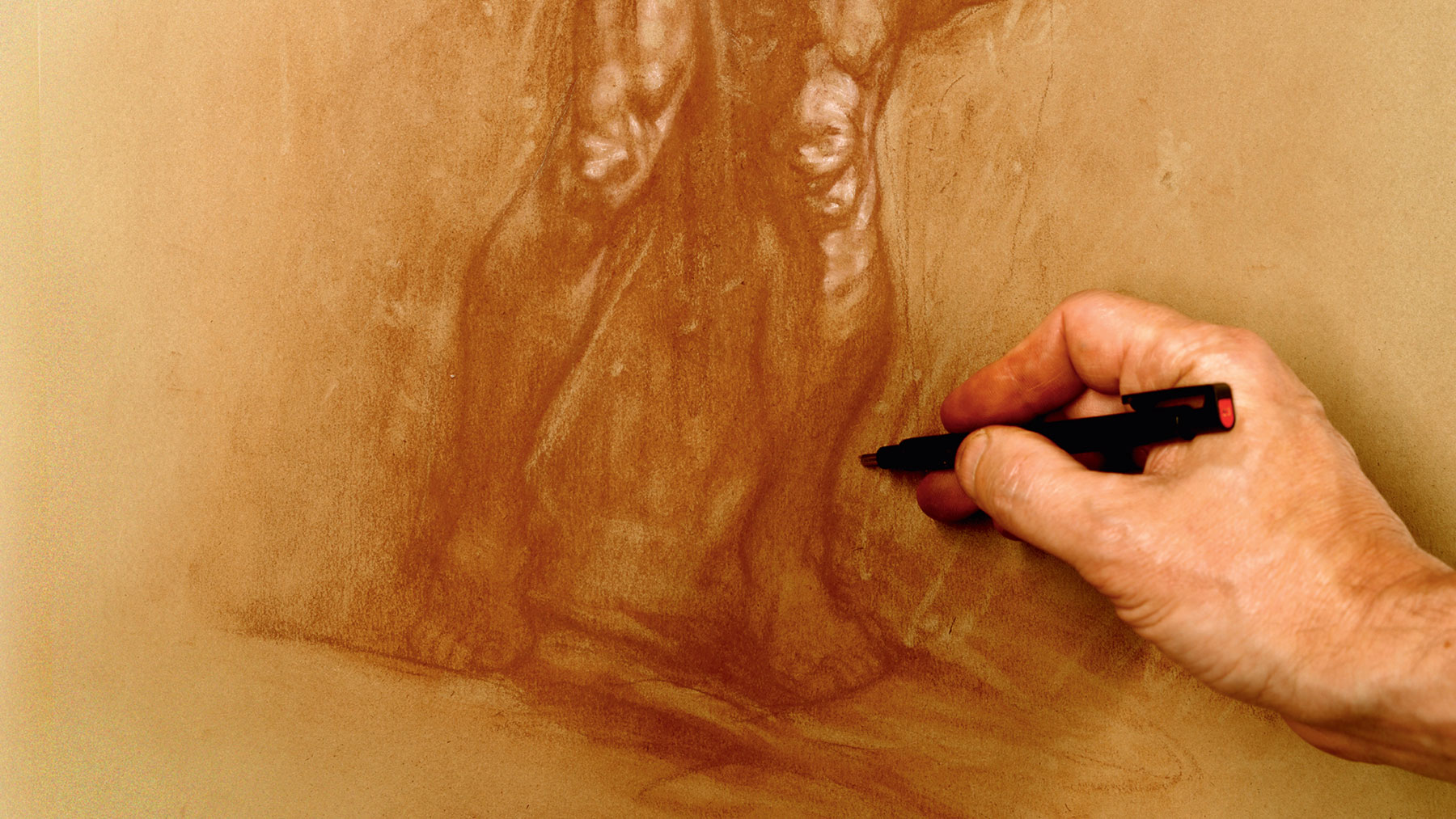 How to draw a figure: Artist removing pigment using an eraser