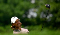 Tommy Fleetwood hits a mini driver off the tee