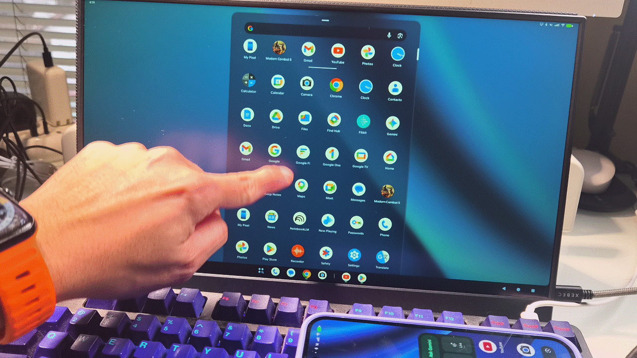 Scrolling on touchscreen display with Pixel 10a desktop mode.