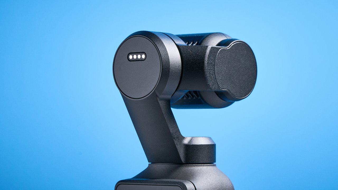 DJI Osmo Pocket 4 against a blue background
