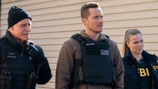 Voight, Halstead, and Upton standing next to each other on Chicago P.D. for the One Chicago crossover.
