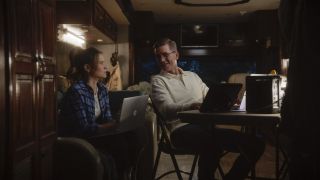 Jimmy Palmer and Jessica Knight working on laptops in Jessica's RV in NCIS