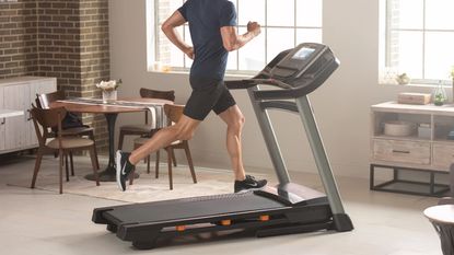 person running on a NordicTrack treadmill