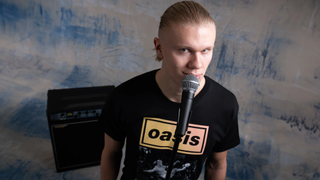 Erling Haaland modelling the Manchester City x Oasis capsule collection