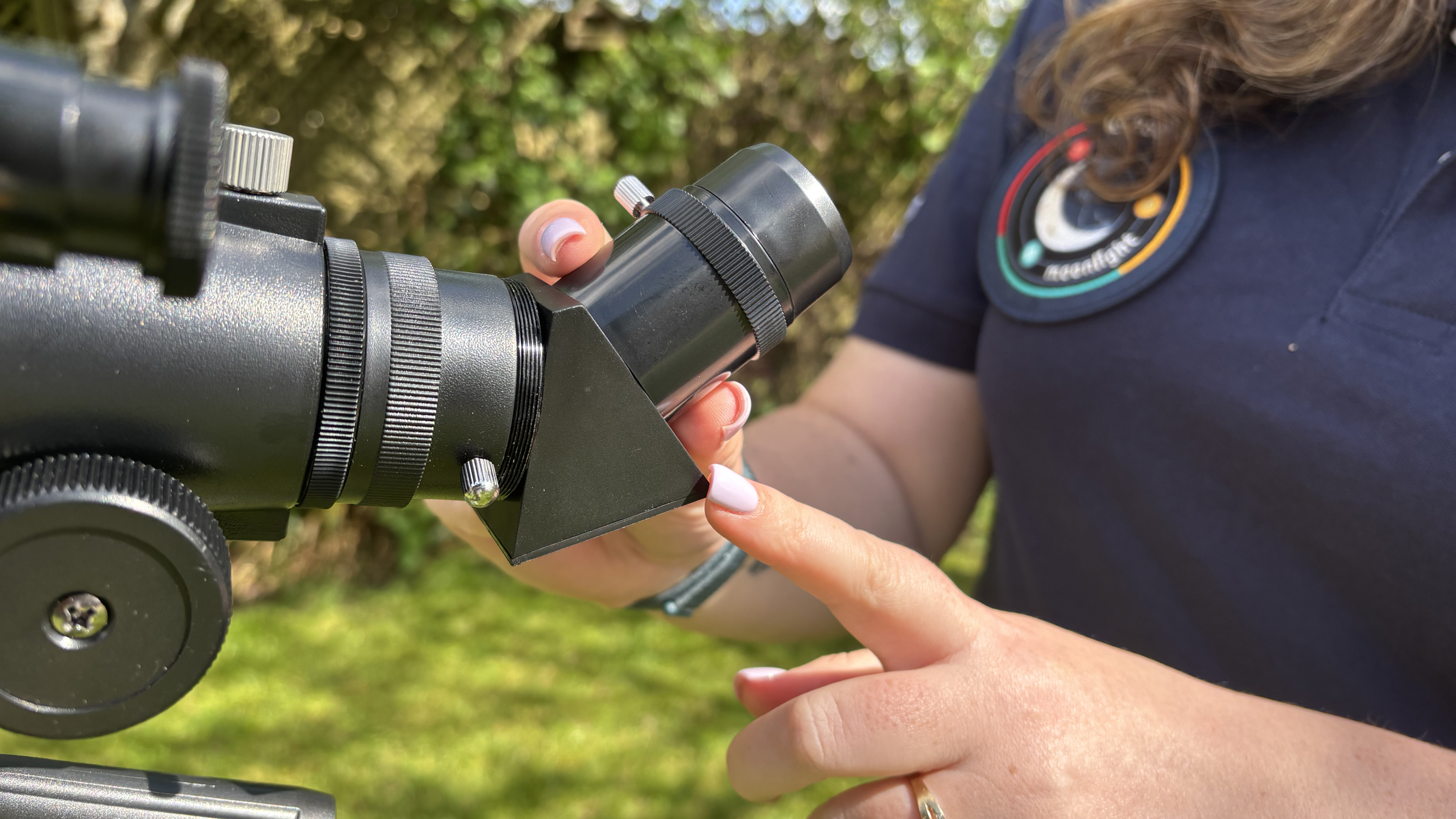Author Gemma Lavender with a Celestron Moon Mission Travel Scope 70.