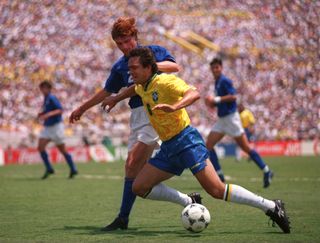 Italy defender Luigi Apolloni challenges Brazil's Branco in the 1994 World Cup final.