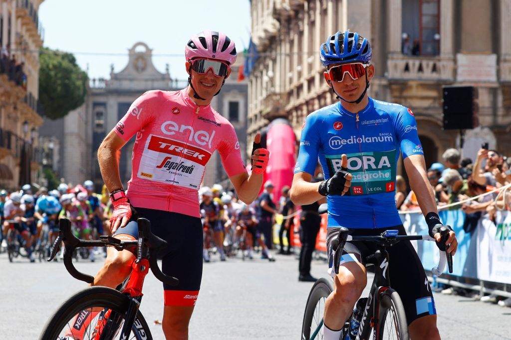 Overall leader Team Treks Spanish rider Juan Pedro Lopez L and Team Boras German rider Lennard Kamna wearing the best climbers blue jersey prepare with fellow riders to take the start of the 4th stage of the Giro dItalia 2022 cycling race 174 kilometers between Catania and Messina Sicily on May 11 2022 Photo by Luca Bettini AFP Photo by LUCA BETTINIAFP via Getty Images