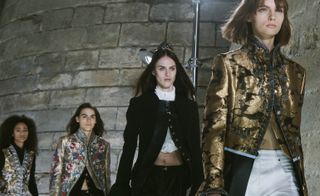 3 Models wearing metallic leather jackets and 1 model wearing black jacket