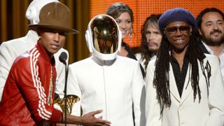 LOS ANGELES, CA - JANUARY 26:(L-R) Musicians Pharrell Williams, Thomas Bangalter and Guy-Manuel De Homem-Christo of Daft Punk, and Nile Rodgers accept the Record of the Year award for 'Get Lu