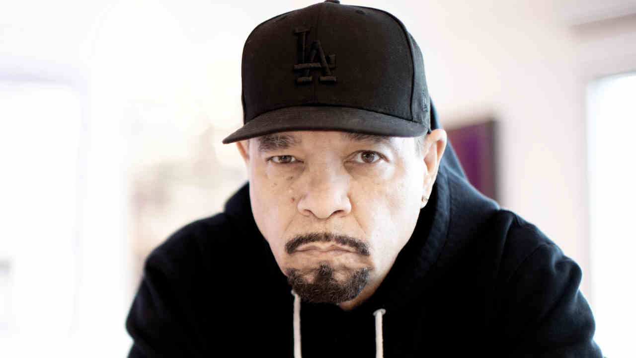 Ice T posing for a photograph at home
