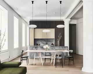 a kitchen dining space in a modern apartment
