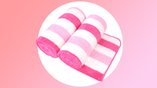 A pink striped pair of rolled towels 