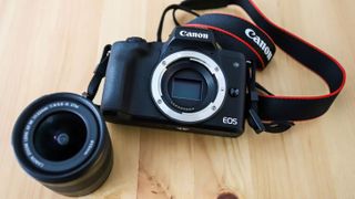 Canon EOS M50 Mark II on a wooden table