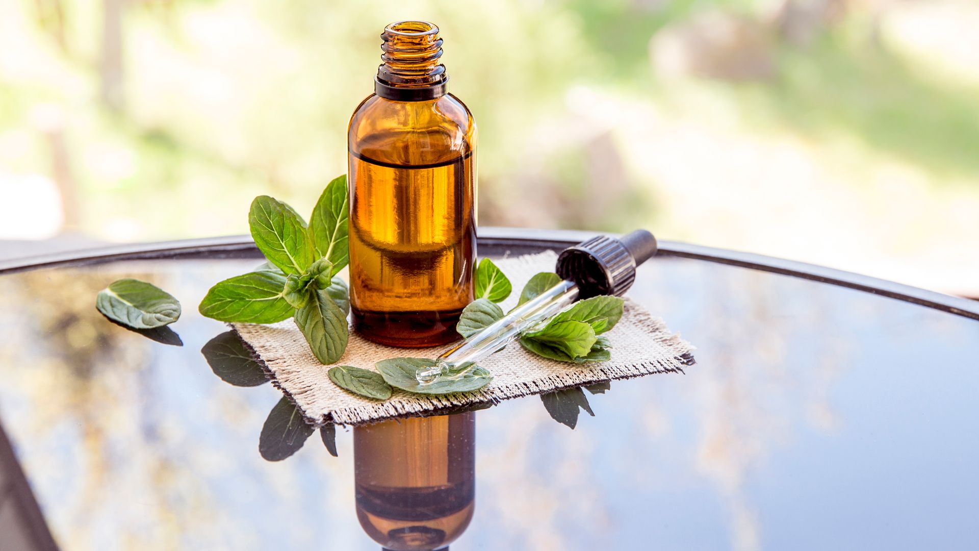 Peppermint oil on an outdoor table as a method of how to keep wasps away
