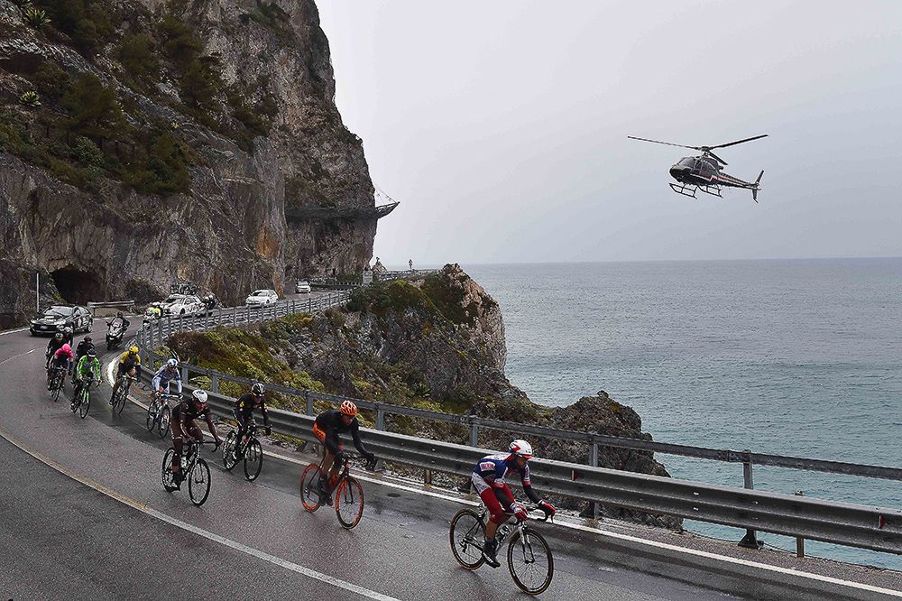 A helicopter films the action during Milan-San Remo.