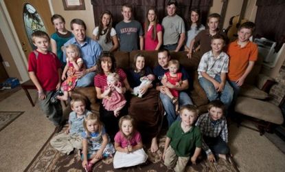 TLC's 19 Kids and Counting brood, including eldest son Josh and his wife Anna's new baby (center): Matriarch Michelle is pregnant with her 20th child.