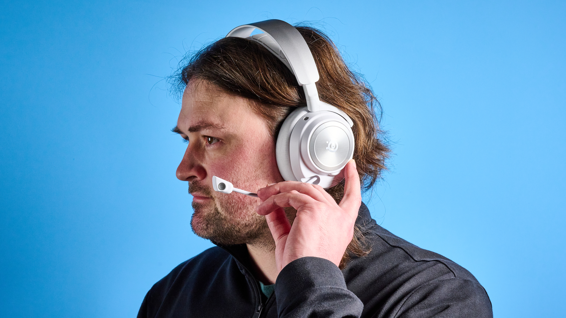 SteelSeries Arctis Nova Pro Wireless in white on a person's head