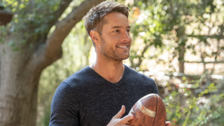 Kevin Pearson holds a football on This Is Us.