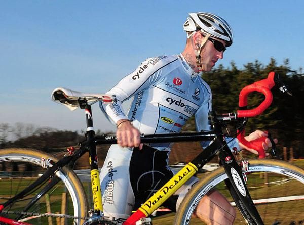 Adam Myerson (Cycle-Smart) running the barriers in sixth place.