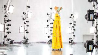 3d scanning, as represented by a photo of a costume dress in front of cameras