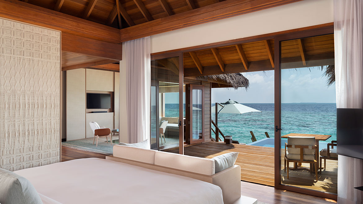 Interior shot of a lagoon bungalow looking out, at Huvafen Fushi