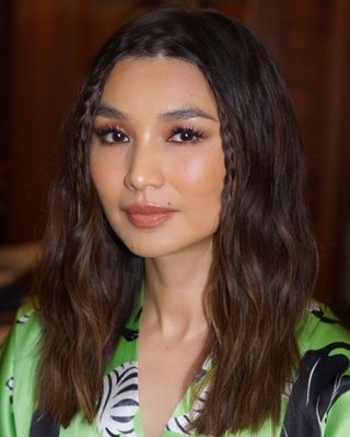 Gemma Chan with baby braids on mid-length hair