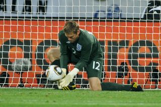 Robert Green of England misjudges the ball and lets in a goal during the 2010 FIFA World Cup South Africa Group C match between England and USA at the Royal Bafokeng Stadium on June 12, 2010 in Rustenburg, South Africa.