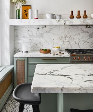 colors that go with light grey, sage green and marble kitchen with open shelving, marble backsplash and countertops, sage green cabinetry, open shelving
