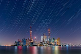 astronomy photographer of the year star trails over the lujiazui city skyline