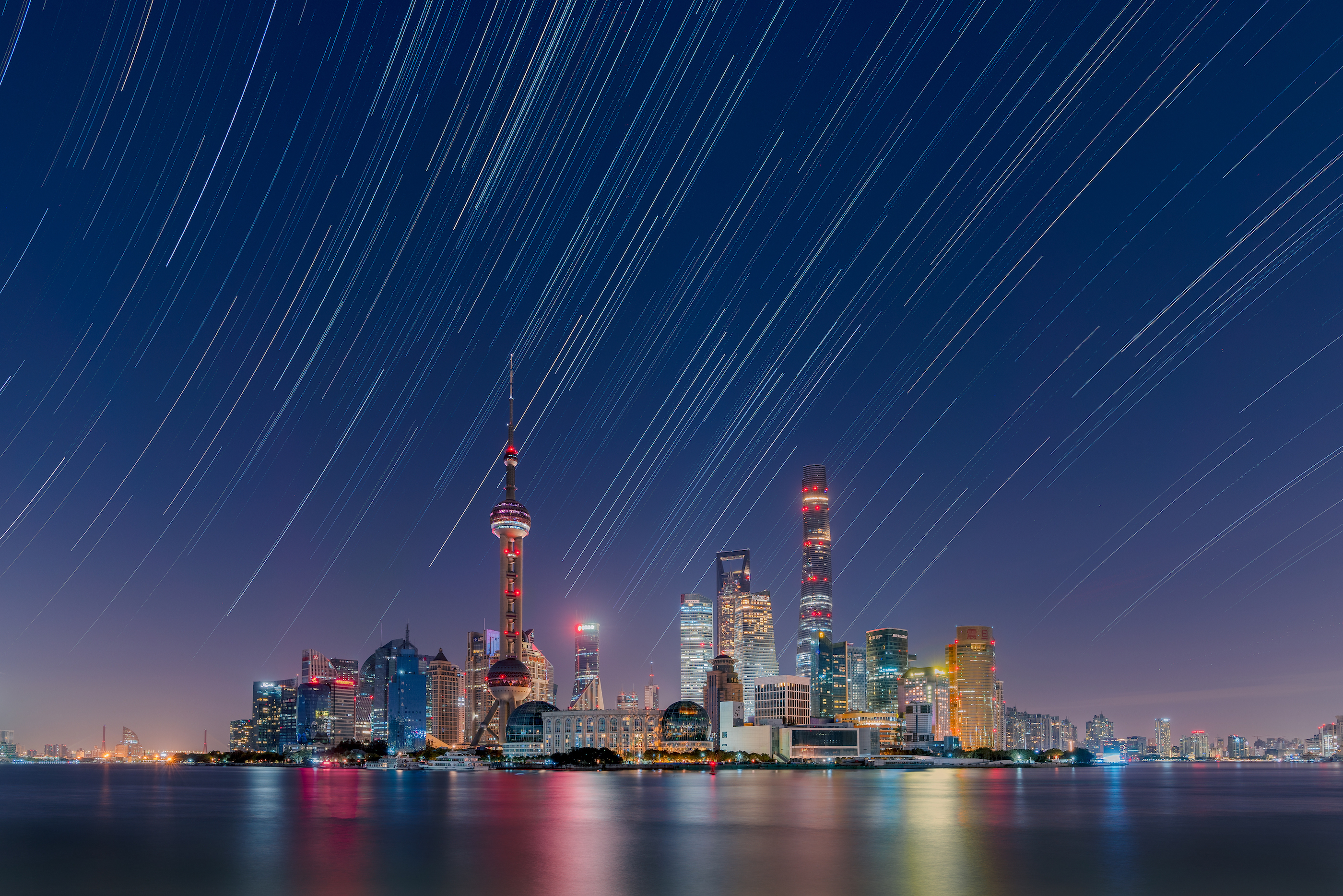 astronomy photographer of the year star trails over the lujiazui city skyline