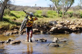 Jodie Willett crosses the last river in Stage 7