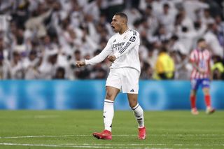 Kylian Mbappe celebrates after scoring for Real Madrid against Atletico Madrid in the derby in February 2025.