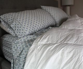 Martha Stewart bedding set on a bed.