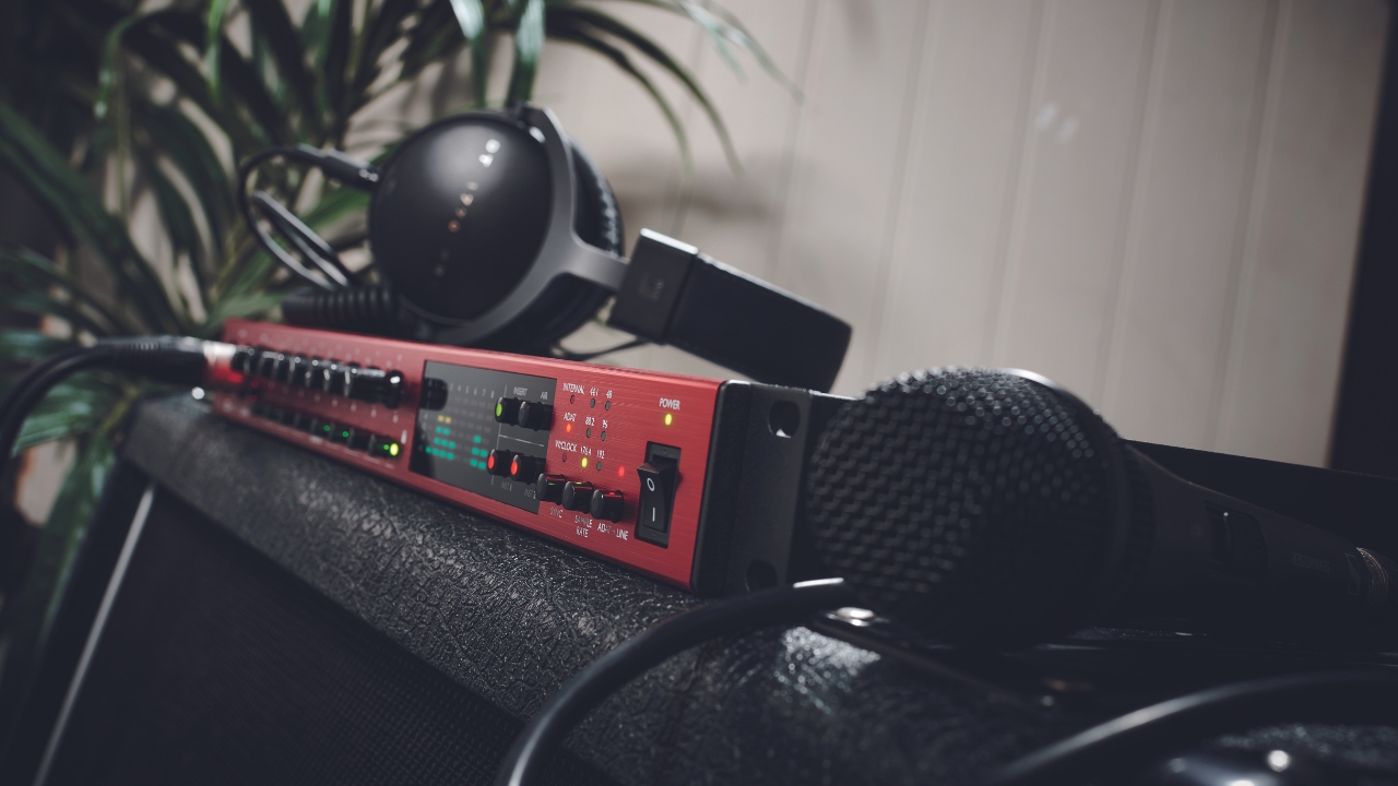 A Focusrite Scarlett Octopre on top of a guitar cabinet
