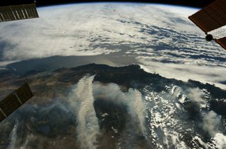 Smoke from the California fires billows far to the east in this image, captured from orbit by NASA astronaut Ricky Arnold.
