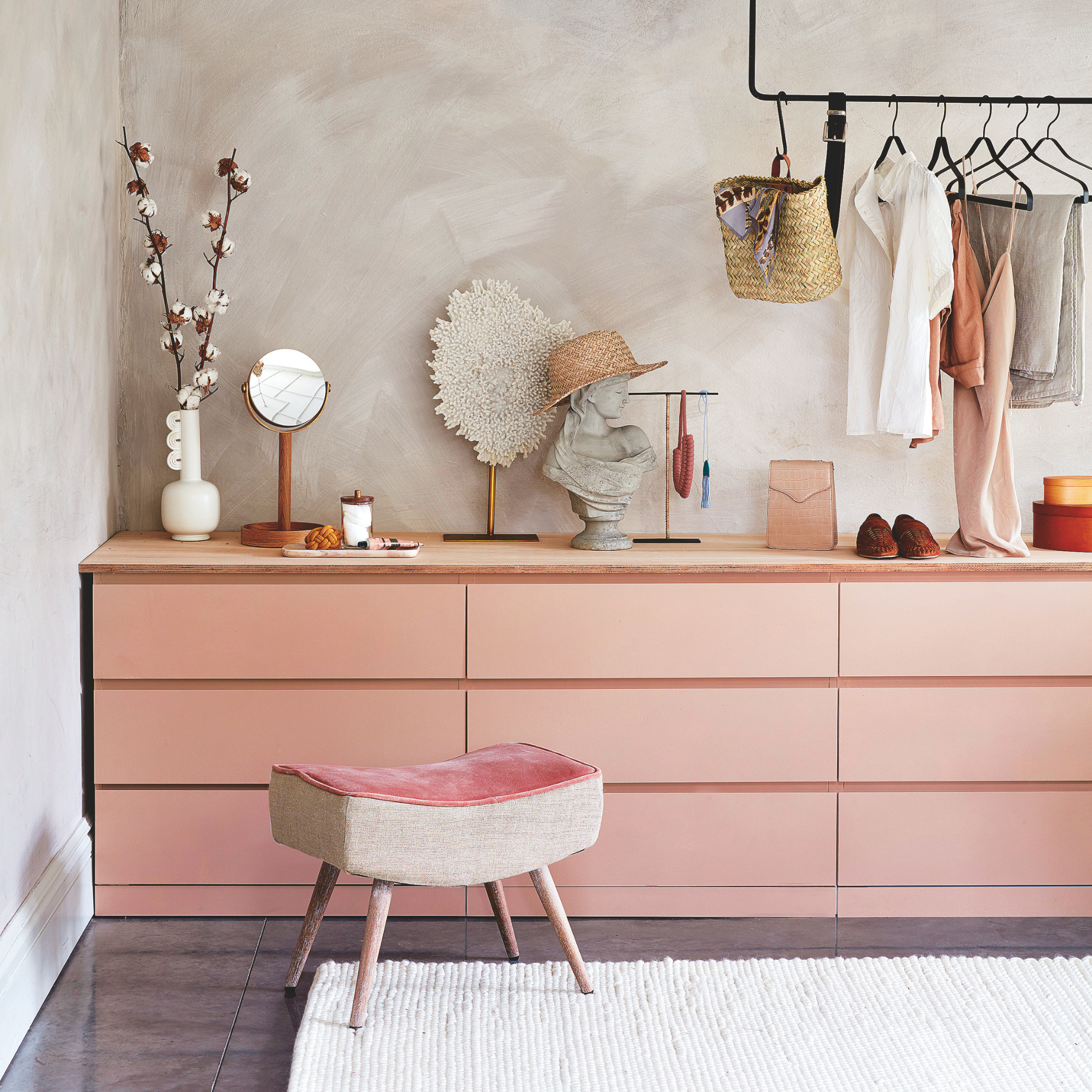 IKEA MALM drawers painted pink in a dressing room.