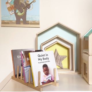 The Ostbit Plate Holder from IKEA, hacked to become book storage in a kids bedroom