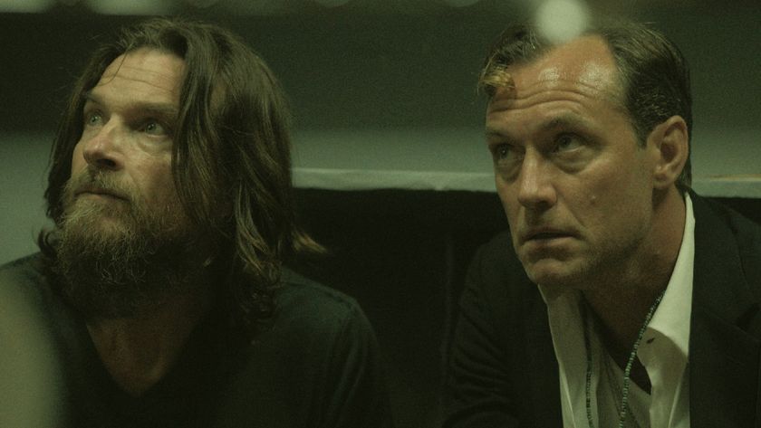 From left to right: Jason Bateman and Jude Law both looking up in Black Rabbit. 