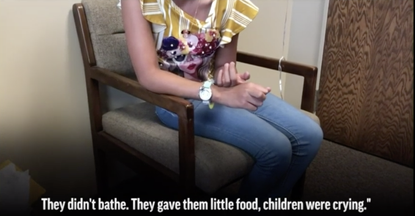 A video still shows a 12-year-old migrant girl being interviewed by her lawyer.