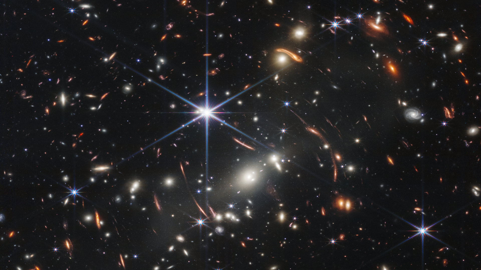 A field of distant galaxies captured by the James Webb Space Telescope.
