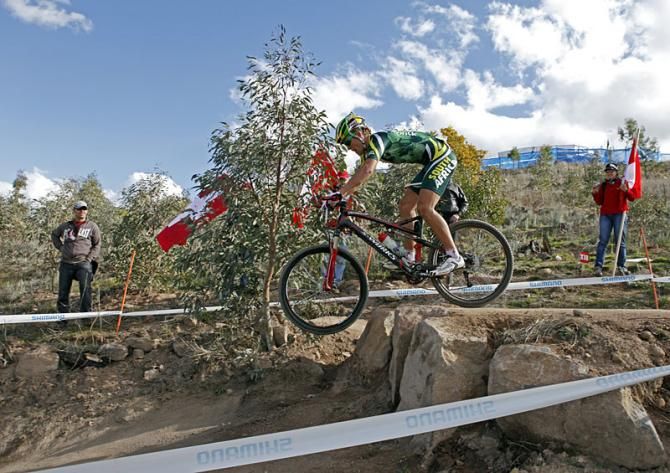Burry Stander catches air while racing to victory at the 2009 Under 23 Worlds