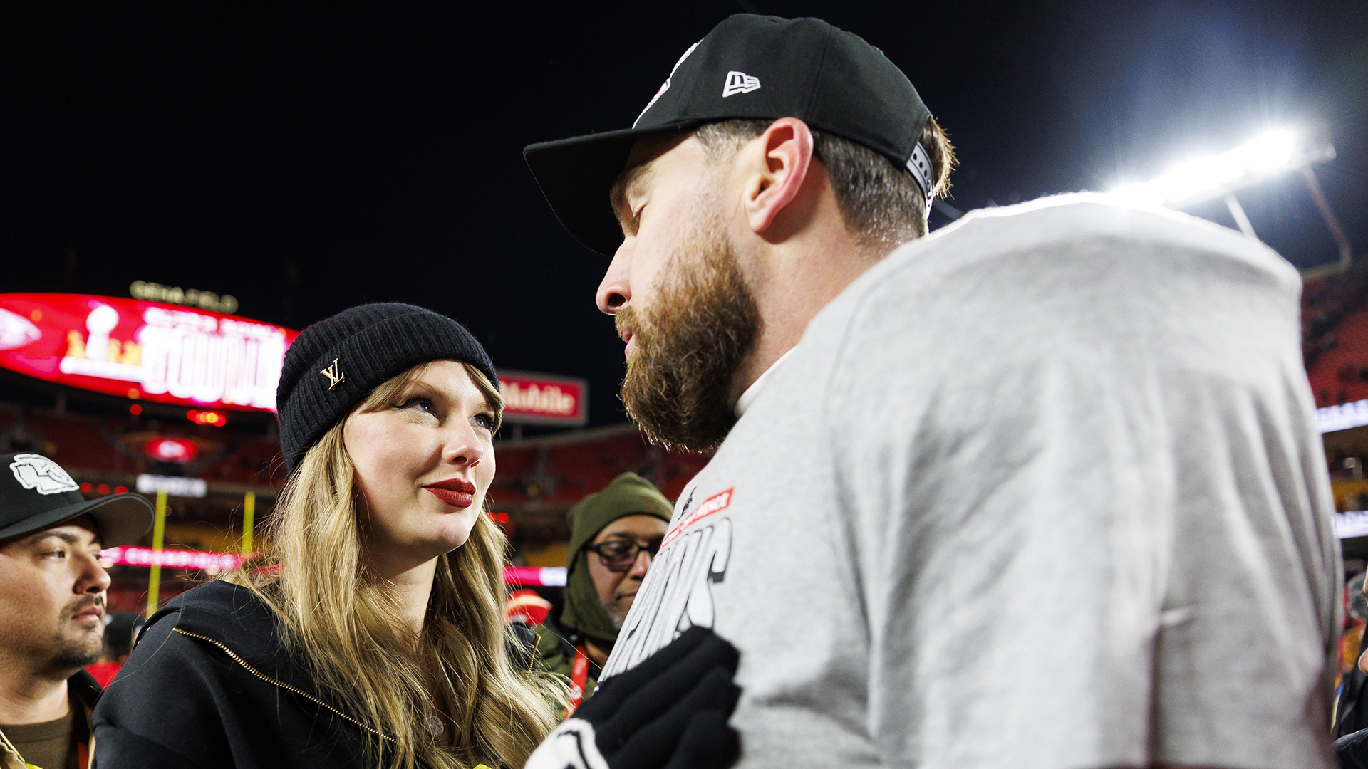 Taylor Swift celebrates with Travis Kelce after the AFC Championship Game at GEHA Field at Arrowhead Stadium on January 26, 2025 in Kansas City, Missouri
