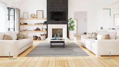 white living room with black fireplace with sofas facing each other to avoid common living room design mistakes