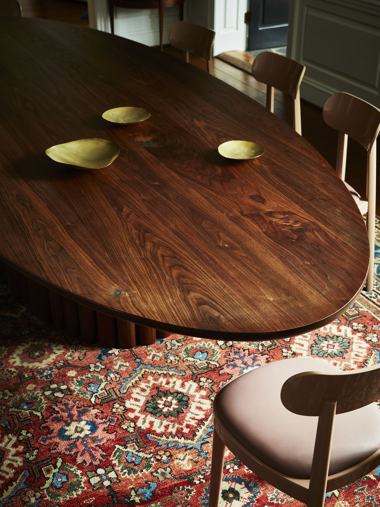 An oval dining table in wood