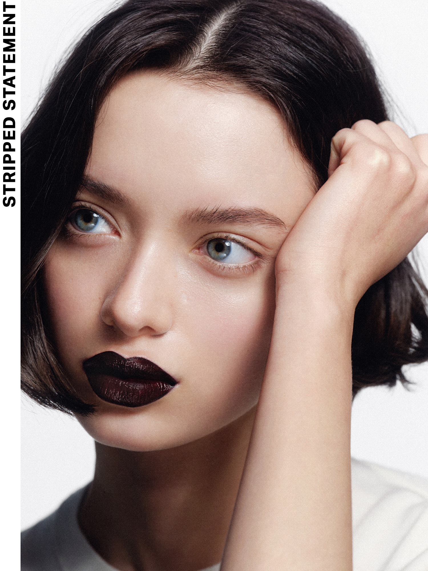 A model wearing the stripped statement French-girl makeup trend