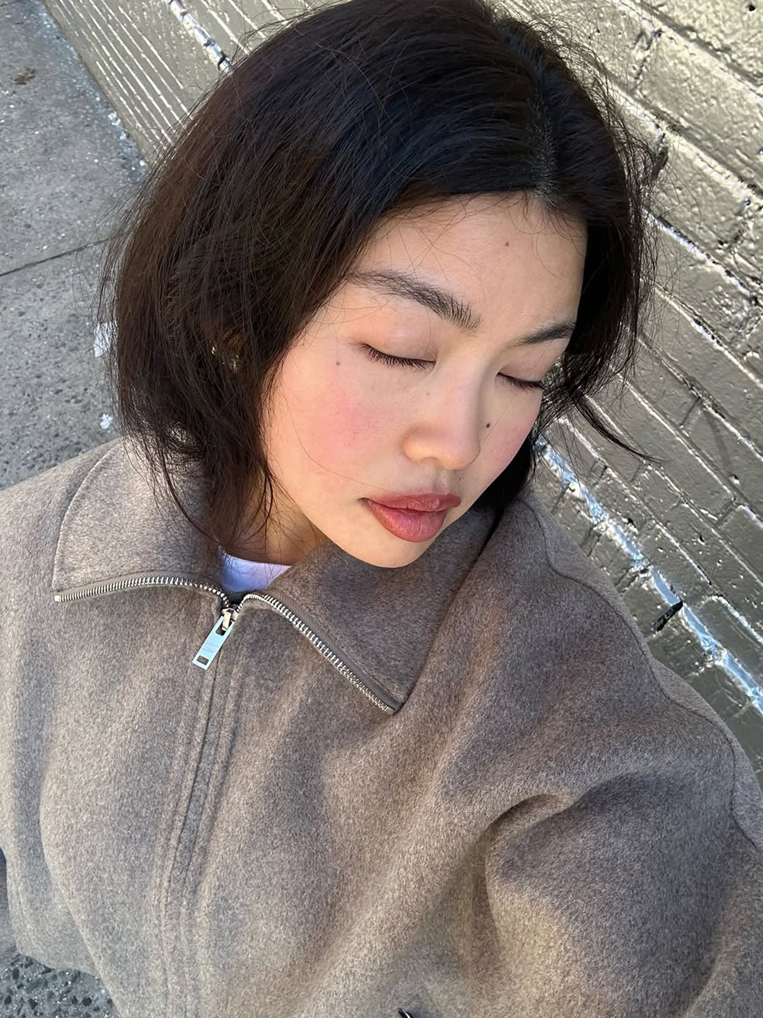 Allison Ho with glowing skin and full, mauve-toned lips
