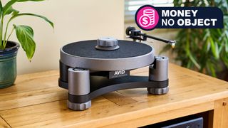 Avid's Relveo turntable on a wooden table, with TR's Money No Object badge 