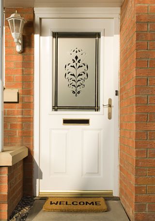 white upvc front door with frosted glazing