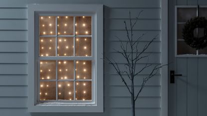 Christmas lights over windows