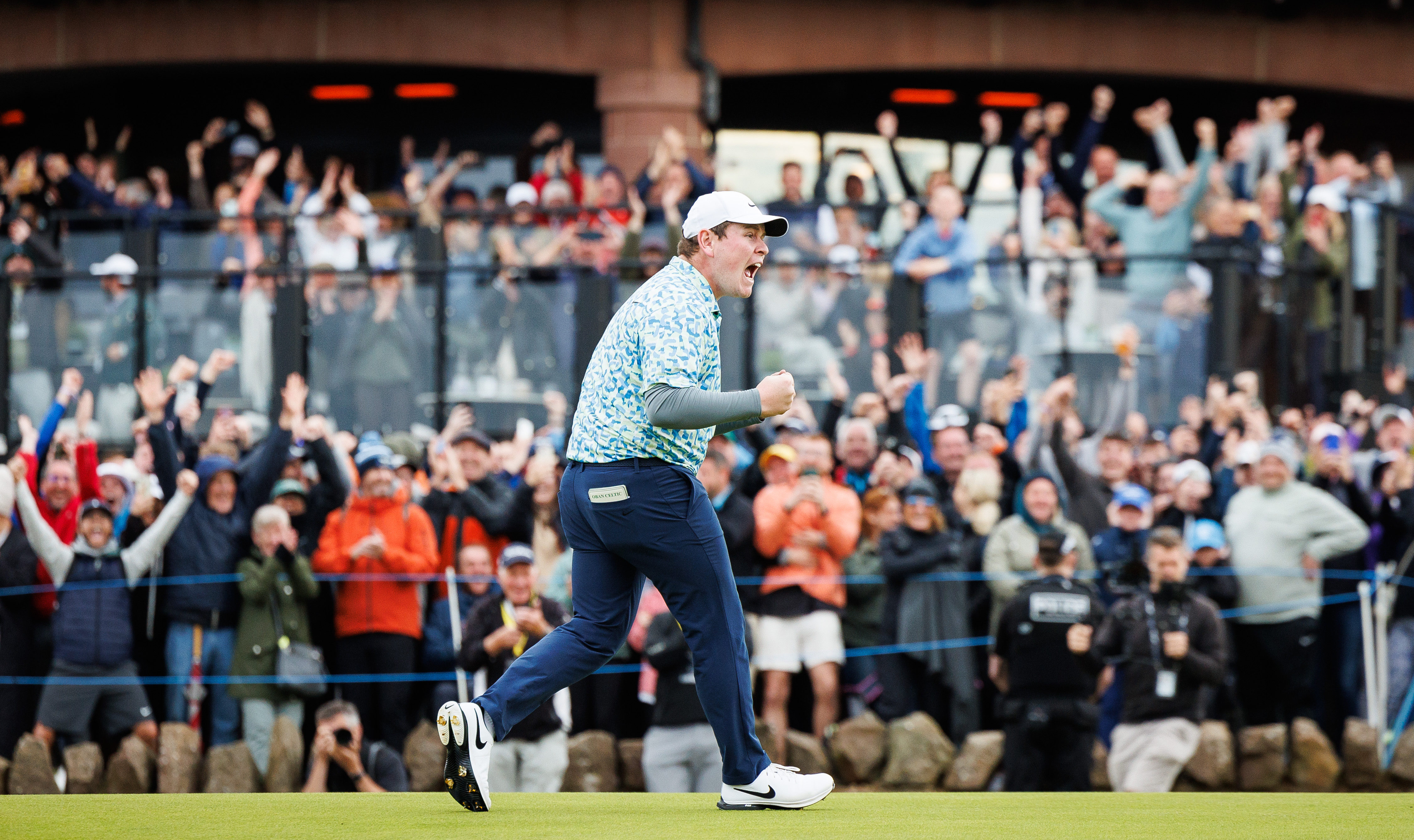 Robert MacIntyre celebrates his Genesis Scottish Open victory on the 18th green